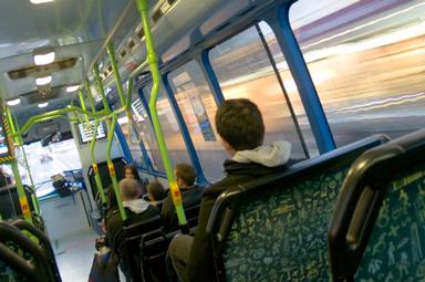 Long exposure on a bus to show movement through the windows as the world flies by